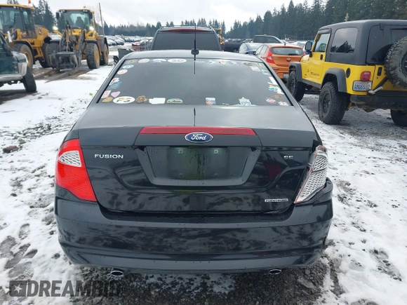 2012 Ford Fusion SE z VIN 3FAHP0HG2CR323380, wystawiony jako IAAI lot #41543660 z przebiegiem 169 059 mil mil oraz . Historia ofert i sprzedaży dostępna na DreamBid. Obrazek 16.