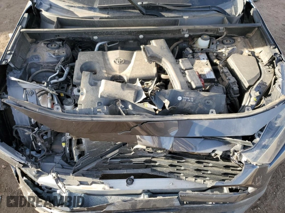 2019 Toyota RAV4 LE with VIN JTMF1RFV0KJ018803, listed as a Copart auction lot 49893715 with 77,595 mi miles and Salvage Title. Bid and sale history available at DreamBid. Image 12.
