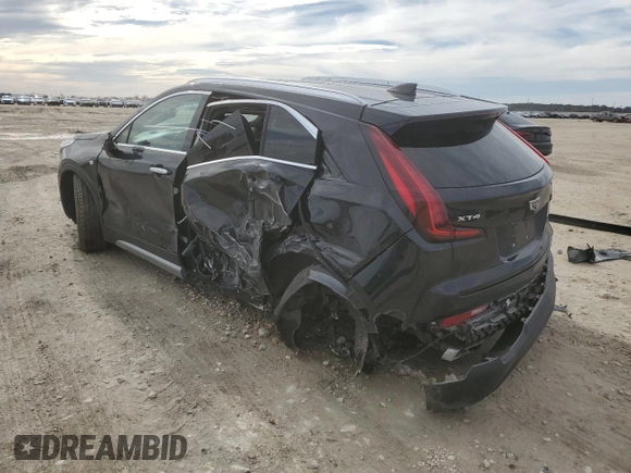 2022 Cadillac XT4 FWD Premium Luxury z VIN 1GYFZCR42NF135325, wystawiony jako Copart lot #43133215 z przebiegiem 48 998 mil mil oraz Szkoda całkowita • Salvage title. Historia ofert i sprzedaży dostępna na DreamBid. Obrazek 2.