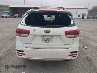 2016 Kia Sorento SX z VIN 5XYPKDA59GG113511, wystawiony jako IAAI lot #41997346 z przebiegiem 140 017 mil mil oraz . Historia ofert i sprzedaży dostępna na DreamBid. Obrazek 17.
