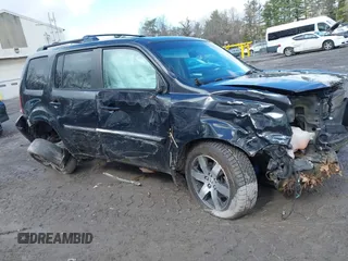 2012 Honda Pilot Touring with VIN 5FNYF4H93CB071923, listed as a IAAI auction lot 41946074 with 175,663 mi miles and . Bid and sale history available at carsss.com. Image 13.