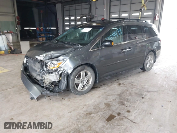 2011 Honda Odyssey Touring с VIN 5FNRL5H90BB025855, выставлен на аукционе IAAI как лот 42104979 с пробегом 165 010 миль миль и . История ставок и продаж доступна на DreamBid. Изображение 2.