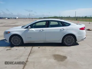 2018 Ford Fusion Titanium with VIN 3FA6P0RU3JR124007, listed as a IAAI auction lot 42207863 with 179,708 mi miles and . Bid and sale history available at DreamBid. Image 14.
