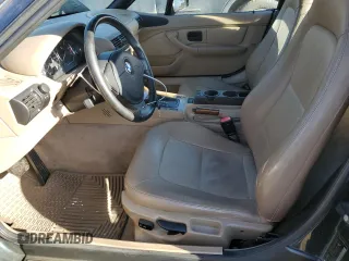 2000 BMW Z3 2.5L with VIN WBACH9341YLM91727, listed as a Copart auction lot 74257874 with 76,062 mi miles and Salvage Title. Bid and sale history available at carsss.com. Image 7.