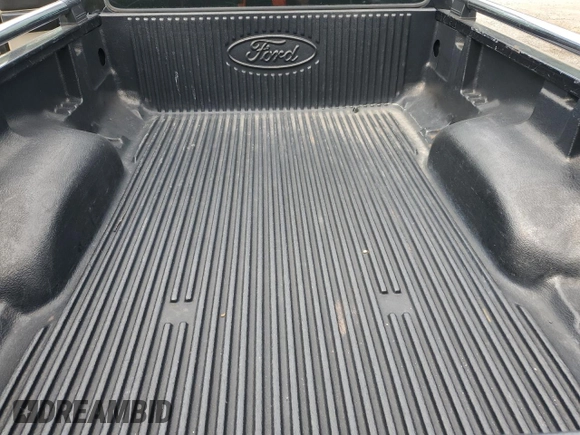2006 Ford Ranger XL z VIN 1FTYR14U06PA74952, wystawiony jako Copart lot #57970005 z przebiegiem 147 886 mil mil oraz Czysty tytuł • Clean title. Historia ofert i sprzedaży dostępna na DreamBid. Obrazek 10.