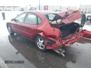 2000 Ford Taurus SE with VIN 1FAFP53U1YG108380, listed as a IAAI auction lot 41798036 with 133,235 mi miles and . Bid and sale history available at DreamBid. Image 3.