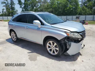 2011 Lexus RX 350 with VIN 2T2ZK1BA9BC056651, listed as a Copart auction lot 57199025 with 104,949 mi miles and Salvage title. Bid and sale history available at DreamBid. Image 4.