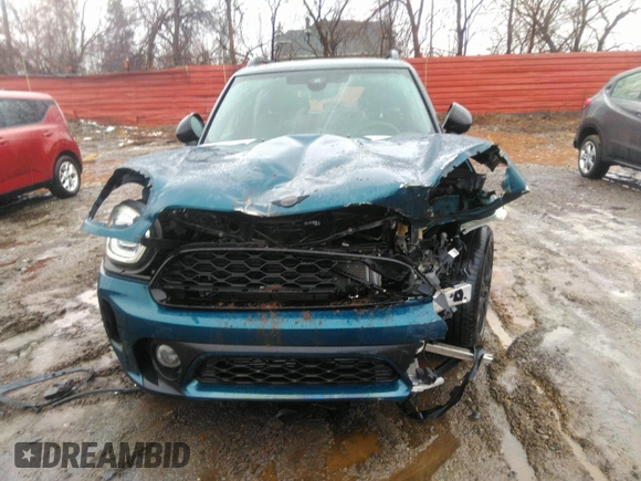 2022 MINI Countryman Cooper S with VIN WMZ83BR06N3N39575, listed as a IAAI auction lot 41477701 with 33,435 mi miles and . Bid and sale history available at DreamBid. Image 12.