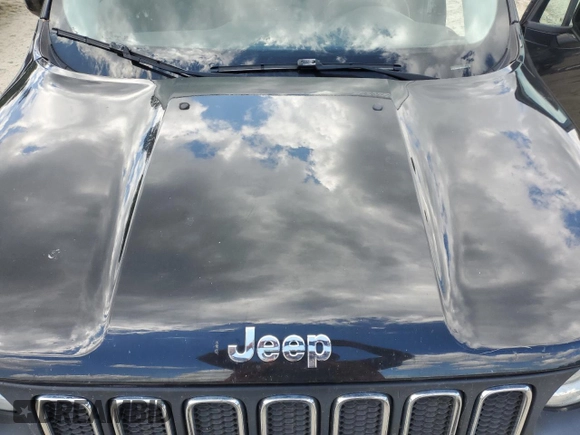 2015 Jeep Renegade Latitude z VIN ZACCJBBT9FPC14808, wystawiony jako Copart lot #55601015 z przebiegiem 176 621 mil mil oraz Szkoda całkowita • Salvage title. Historia ofert i sprzedaży dostępna na DreamBid. Obrazek 12.