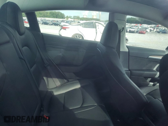 2023 Tesla Model 3 z VIN 5YJ3E1EA7PF573852, wystawiony jako Copart lot #57662565 z przebiegiem Nie podano mil oraz Szkoda całkowita • Salvage title. Historia ofert i sprzedaży dostępna na DreamBid. Obrazek 10.