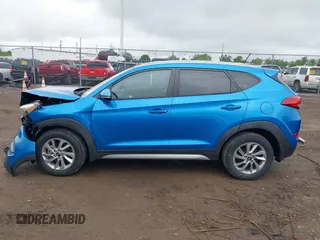 2017 Hyundai Tucson Sport z VIN KM8J33A23HU319048, wystawiony jako IAAI lot #42340603 z przebiegiem 51 738 mil mil oraz . Historia ofert i sprzedaży dostępna na DreamBid. Obrazek 15.