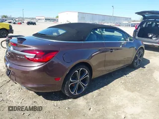 2016 Buick Cascada Premium with VIN W04WT3N55GG116328, listed as a IAAI auction lot 41854034 with 146,423 mi miles and . Bid and sale history available at DreamBid. Image 4.