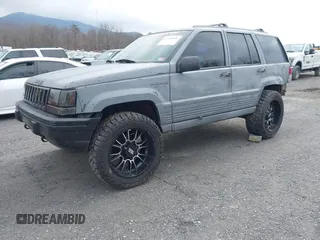 1995 Jeep Grand Cherokee Laredo with VIN 1J4GZ58S4SC778322, listed as a IAAI auction lot 41498800 with 255,058 mi miles. Bid and sale history available at carsss.com. Image 18.