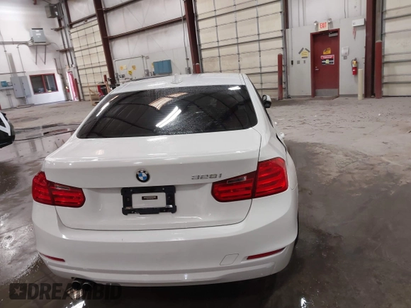 2014 BMW 3 Series 328i with VIN WBA3C1C52EK112194, listed as a IAAI auction lot 41694770 with 139,609 mi miles. Bid and sale history available at carsss.com. Image 16.