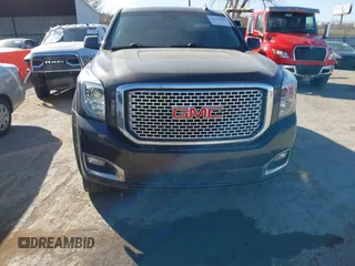 2015 GMC Yukon XL Denali with VIN 1GKS2JKJ9FR634771, listed as a IAAI auction lot 41676218 with 73,271 mi miles. Bid and sale history available at carsss.com. Image 12.
