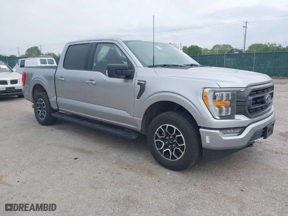 2023 Ford F-150 XL with VIN 1FTFW1E51PFB56848, listed as a IAAI auction lot 42067155 with 56,936 mi miles. Bid and sale history available at carsss.com. Image 1.
