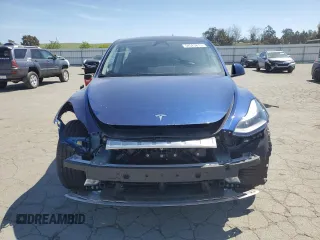 2024 Tesla Model Y Long Range z VIN 7SAYGAEE3RF034699, wystawiony jako Copart lot #54523815 z przebiegiem 9 764 mil mil oraz Szkoda całkowita • Salvage title. Historia ofert i sprzedaży dostępna na DreamBid. Obrazek 5.