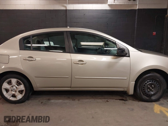 2009 Nissan Sentra S FE+ z VIN 3N1AB61E19L655492, wystawiony jako IAAI lot #42169403 z przebiegiem 131 164 mil mil oraz . Historia ofert i sprzedaży dostępna na DreamBid. Obrazek 13.