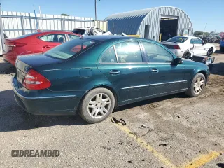 2003 Mercedes-Benz E-Class 3.2L with VIN WDBUF65J53A101021, listed as a Copart auction lot 73015774 with 242,812 mi miles and Clean Title. Bid and sale history available at carsss.com. Image 3.