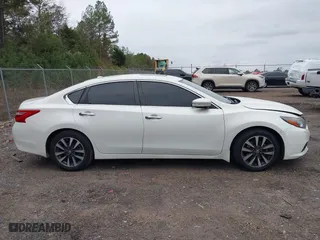 2017 Nissan Altima 2.5 SR with VIN 1N4AL3AP7HC120659, listed as a IAAI auction lot 40816224 with 131,721 mi miles. Bid and sale history available at carsss.com. Image 13.