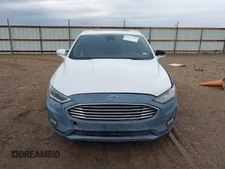 2019 Ford Fusion Titanium with VIN 3FA6P0D93KR138574, listed as a IAAI auction lot 41967094 with 118,297 mi miles. Bid and sale history available at carsss.com. Image 12.