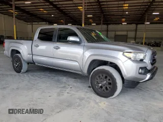 2020 Toyota Tacoma SR5 with VIN 3TMDZ5BN3LM084023, listed as a Copart auction lot 56466905 with 35,921 mi miles and Non repairable. Bid and sale history available at DreamBid. Image 4.