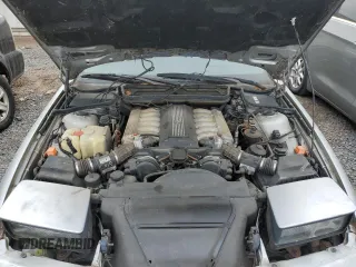 1991 BMW 8 Series z VIN WBAEG2311MCB72270, wystawiony jako Copart lot #88514425 z przebiegiem 185 028 mil mil oraz Czysty tytuł • Clean title. Historia ofert i sprzedaży dostępna na DreamBid. Obrazek 11.