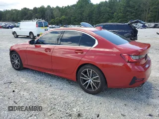 2019 BMW 3 Series 330i with VIN WBA5R1C51KFH18066, listed as a Copart auction lot 60600665 with 142,789 mi miles and Salvage title. Bid and sale history available at DreamBid. Image 2.