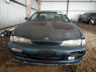 1995 Nissan 240SX z VIN JN1AS44D6SW020744, wystawiony jako Copart lot #64406924 z przebiegiem 87 165 mil mil oraz Szkody całkowita. Historia ofert i sprzedaży dostępna na DreamBid. Obrazek 5.