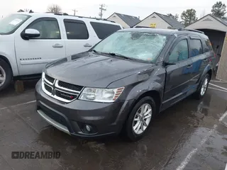 2015 Dodge Journey SXT with VIN 3C4PDCBB7FT735721, listed as a IAAI auction lot 41775824 with 113,446 mi miles and . Bid and sale history available at DreamBid. Image 2.