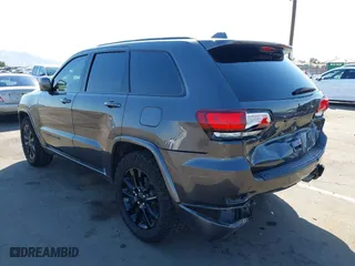 2021 Jeep Grand Cherokee Laredo X with VIN 1C4RJEAG2MC785610, listed as a IAAI auction lot 40578955 with 58,213 mi miles. Bid and sale history available at carsss.com. Image 3.