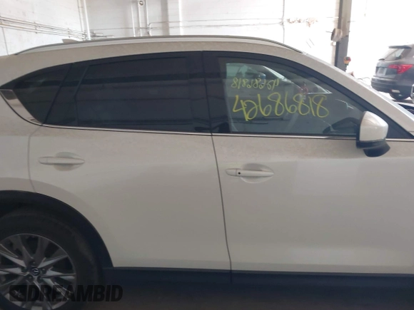 2019 Mazda CX-5 Grand Touring with VIN JM3KFBDM5K0520852, listed as a IAAI auction lot 42686818 with 36,800 mi miles and . Bid and sale history available at DreamBid. Image 13.