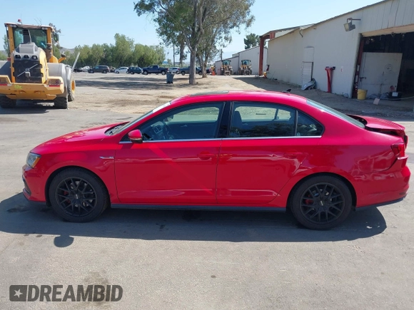 2017 Volkswagen Jetta GLI z VIN 3VW4T7AJ3HM350575, wystawiony jako IAAI lot #42303994 z przebiegiem 168 622 mil mil oraz . Historia ofert i sprzedaży dostępna na DreamBid. Obrazek 14.