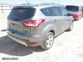 2014 Ford Escape SE with VIN 1FMCU0GXXEUD93750, listed as a IAAI auction lot 41732576 with 160,625 mi miles. Bid and sale history available at carsss.com. Image 4.