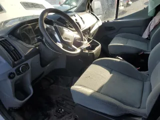 2016 Ford Transit Cargo z VIN 1FTYR2CM8GKA40117, wystawiony jako Copart lot #42287895 z przebiegiem Nie podano mil oraz Szkoda całkowita • Salvage title. Historia ofert i sprzedaży dostępna na DreamBid. Obrazek 7.