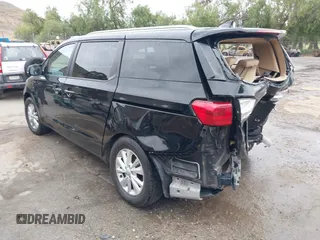 2015 Kia Sedona LX with VIN KNDMB5C14F6051455, listed as a IAAI auction lot 41991513 with 154,967 mi miles and . Bid and sale history available at DreamBid. Image 3.