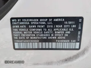 2012 Volkswagen Passat S with VIN 1VWAH7A33CC020242, listed as a IAAI auction lot 42034882 with 188,488 mi miles and . Bid and sale history available at DreamBid. Image 9.