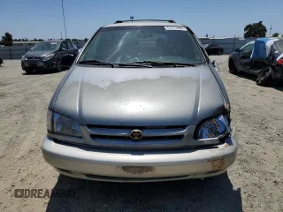 1998 Toyota Sienna LE with VIN 4T3ZF13C4WU064791, listed as a Copart auction lot 61411865 with 218,835 mi miles and Salvage title. Bid and sale history available at DreamBid. Image 5.