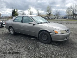 2001 Toyota Camry CE with VIN JT2BG22K810542441, listed as a Copart auction lot 52969515 with 251,008 mi miles and Salvage Title. Bid and sale history available at DreamBid. Image 4.