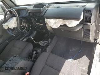 2005 Jeep Wrangler Sport z VIN 1J4FA49S75P324462, wystawiony jako Copart lot #59818995 z przebiegiem 183 558 mil mil oraz Nie do naprawy • Non repairable. Historia ofert i sprzedaży dostępna na DreamBid. Obrazek 8.