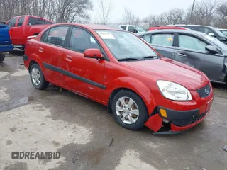 2009 Kia Rio SX with VIN KNADE223796561406, listed as a IAAI auction lot 41650749 with 100,041 mi miles. Bid and sale history available at carsss.com. Image 1.