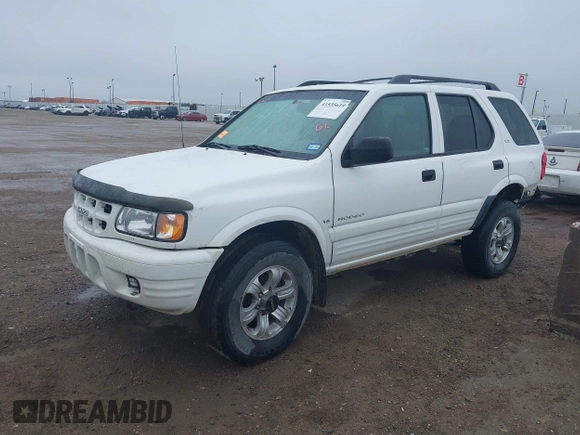 2001 Isuzu Rodeo S with VIN 4S2DM58WX14315138, listed as a IAAI auction lot 41535619 with 217,960 mi miles and . Bid and sale history available at DreamBid. Image 2.