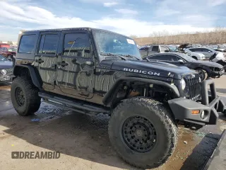2018 Jeep Wrangler JK Unlimited Rubicon with VIN 1C4BJWFG0JL899973, listed as a Copart auction lot 41428895 with 88,357 mi miles and Salvage Title. Bid and sale history available at carsss.com. Image 4.