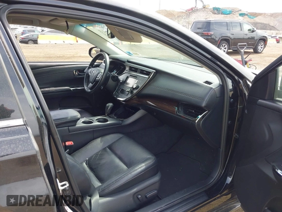 2013 Toyota Avalon XLE with VIN 4T1BK1EB3DU051683, listed as a IAAI auction lot 42118150 with 177,504 mi miles and . Bid and sale history available at DreamBid. Image 5.
