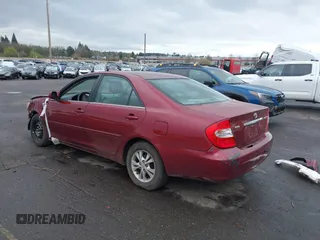 2005 Toyota Camry LE with VIN 4T1BF32K95U092132, listed as a IAAI auction lot 41831969 with 103,466 mi miles and . Bid and sale history available at DreamBid. Image 3.