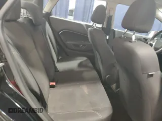 2019 Ford Fiesta SE z VIN 3FADP4BJ9KM151046, wystawiony jako Copart lot #56862255 z przebiegiem 77 002 mil mil oraz Tytuł czysty. Historia ofert i sprzedaży dostępna na DreamBid. Obrazek 10.