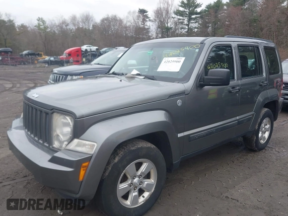 2012 Jeep Liberty Sport with VIN 1C4PJMAK4CW199803, listed as a IAAI auction lot 42025900 with 169,824 mi miles and . Bid and sale history available at carsss.com. Image 2.