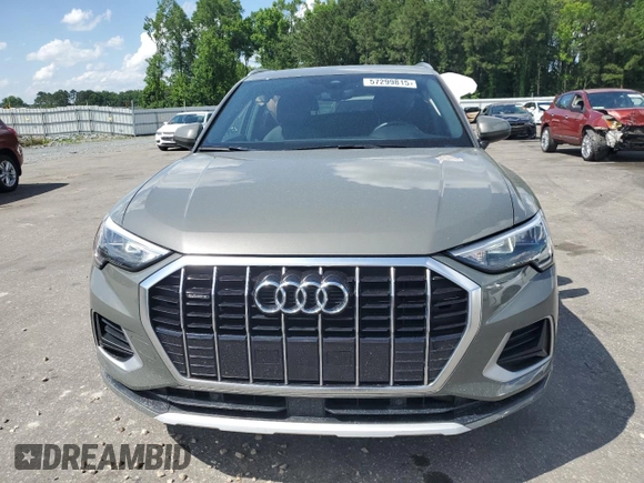 2021 Audi Q3 Premium with VIN WA1AUCF37M1067054, listed as a Copart auction lot 57299815 with 67,334 mi miles and Salvage title. Bid and sale history available at DreamBid. Image 5.