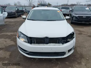 2014 Volkswagen Passat Wolfsburg Ed with VIN 1VWAS7A30EC119833, listed as a IAAI auction lot 41429589 with 181,630 mi miles. Bid and sale history available at carsss.com. Image 12.
