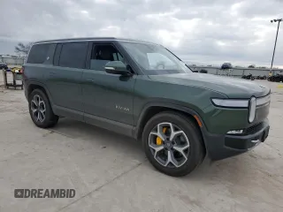 2024 Rivian R1S Adventure with VIN 7PDSGABA6RN041211, listed as a Copart auction lot 87167654 with Not Provided miles and Salvage Title. Bid and sale history available at carsss.com. Image 4.